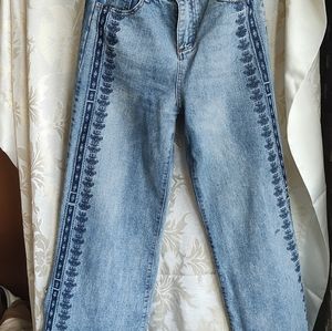 High waisted beautiful embroidered blue jeans.